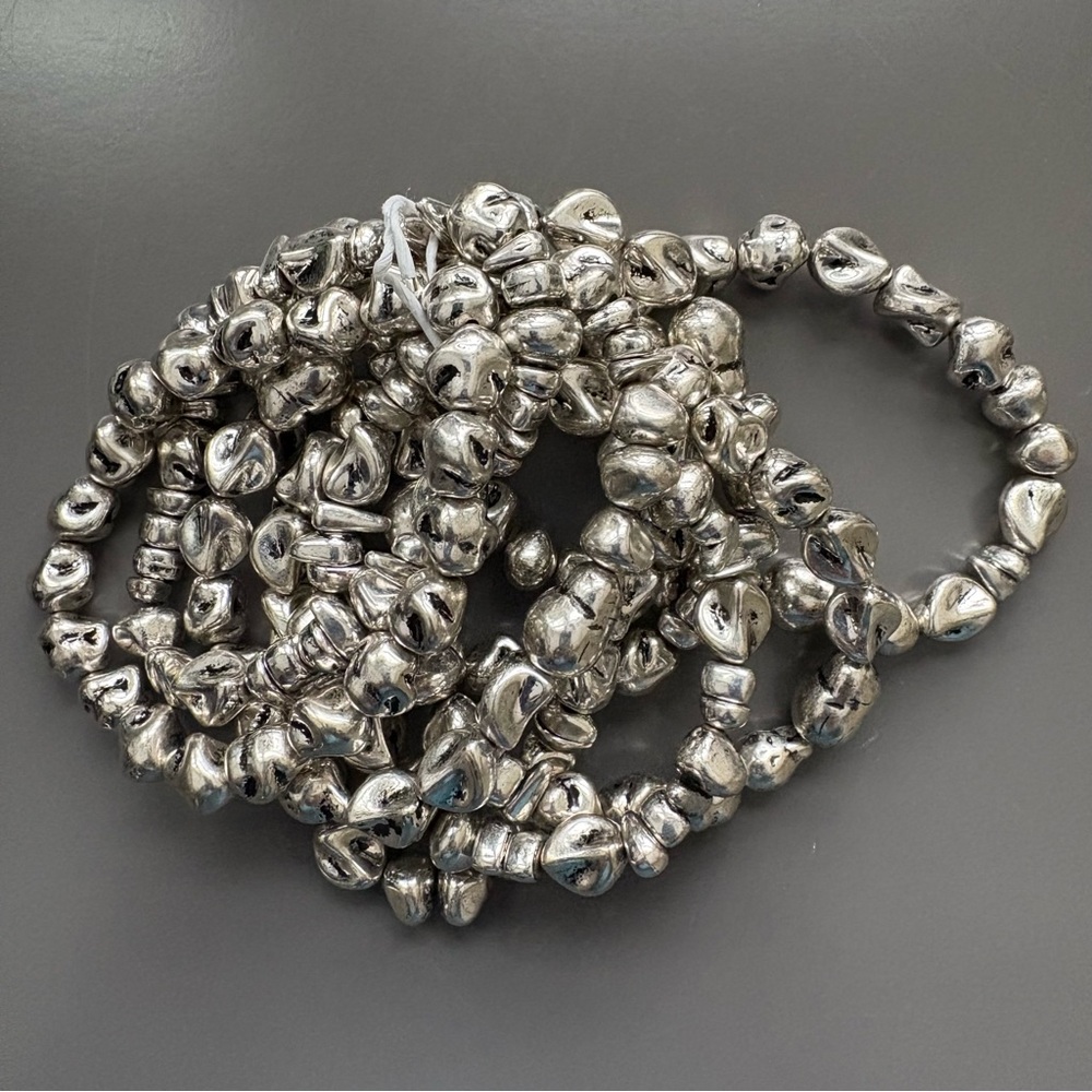 NWOT, Zara Pack of 8 Elastic Stretch Stackable Silver Tone Nugget Bracelets.